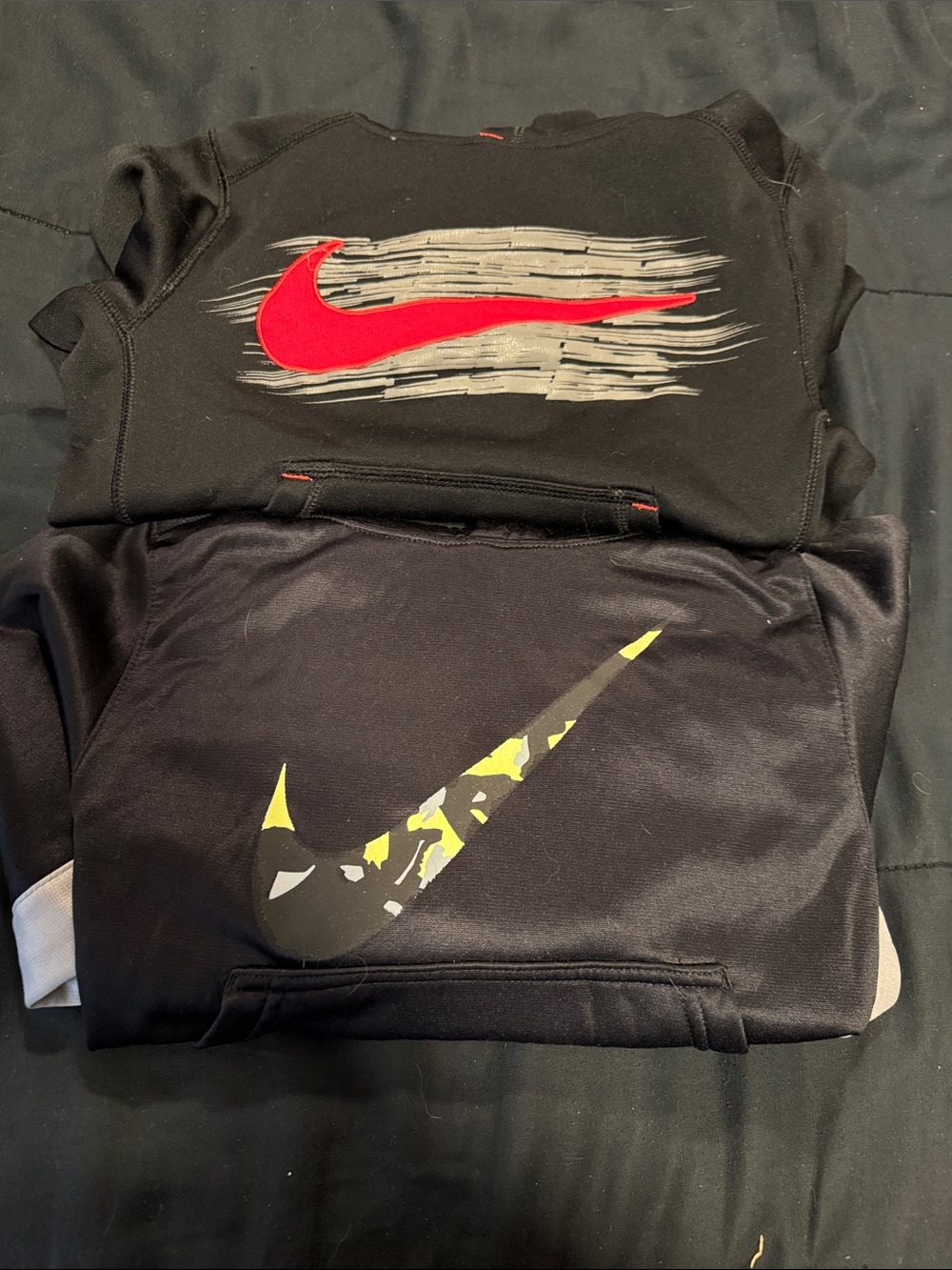 Nike Black Sweatshirts with Red and Yellow Swoosh Accents